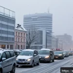 라트비아 대기오염 수준 - A detailed urban scene in Riga, Latvia, showing heavy traffic with cars emitting visible exhaust fum...